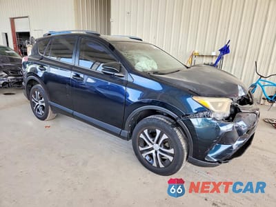 Czwarte zdjęcie samochodu z boku: 2017 TOYOTA RAV4 LE VIN:JTMZFREV7HJ127283 - miniatura