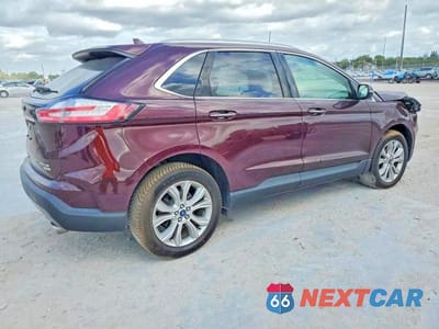 Trzecie zdjęcie samochodu z tyłu: 2019 FORD EDGE TITANIUM VIN:2FMPK3K90KBC15770 - miniatura