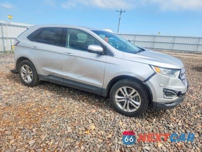 Czwarte zdjęcie samochodu z boku: 2018 FORD EDGE SEL VIN:2FMPK4J99JBC46831 - miniatura