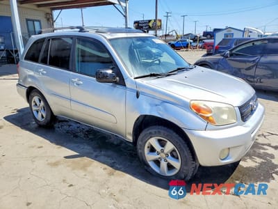 Czwarte zdjęcie samochodu z boku: 2004 TOYOTA RAV4 BASE VIN:JTEGD20V640029983 - miniatura