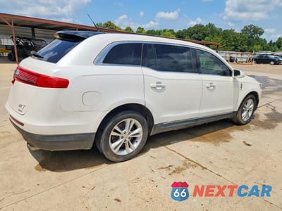 Trzecie zdjęcie samochodu z tyłu: 2014 LINCOLN MKT VIN:2LMHJ5AT7EBL55467 - miniatura