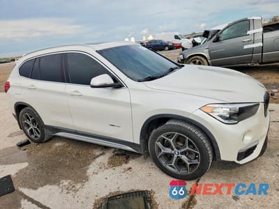 Czwarte zdjęcie samochodu z boku: 2016 BMW X1 XDRIVE28I VIN:WBXHT3C34GP881095 - miniatura