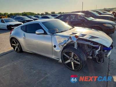 Czwarte zdjęcie samochodu z boku: 2017 NISSAN 370Z BASE VIN:JN1AZ4EHXHM953497 - miniatura