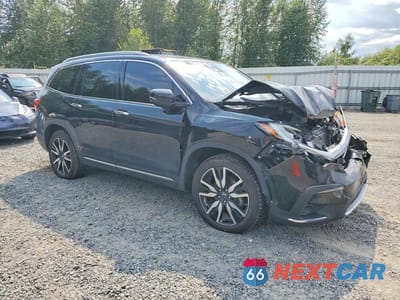 Czwarte zdjęcie samochodu z boku: 2022 HONDA PILOT TOURING VIN:5FNYF5H99NB014716 - miniatura