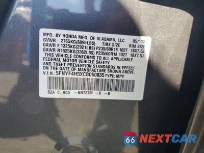 Zdjęcie 12 z 12 samochodu: 2012 HONDA PILOT EXL VIN:5FNYF4H5XCB060835 - miniatura