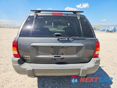 Zdjęcie 6 z 12 samochodu: 2002 JEEP GRAND CHEROKEE LAREDO VIN:1J4GW48S82C169852 - miniatura
