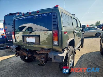 Trzecie zdjęcie samochodu z tyłu: 2003 HUMMER H2 VIN:5GRGN23U03H132240 - miniatura