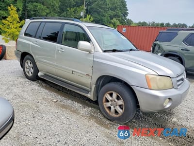 Czwarte zdjęcie samochodu z boku: 2003 TOYOTA HIGHLANDER LIMITED VIN:JTEHF21A930110470 - miniatura
