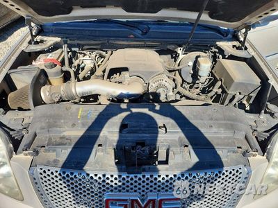 Zdjęcie 12 z 13 samochodu: 2007 GMC YUKON XL DENALI VIN:1GKFK66897J368495 - miniatura
