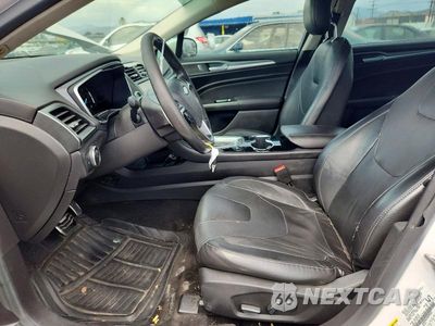 Zdjęcie 7 z 12 samochodu: 2014 FORD FUSION TITANIUM PHEV VIN:3FA6P0SU3ER299342 - miniatura