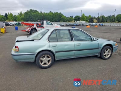 Trzecie zdjęcie samochodu z tyłu: 1992 HONDA ACCORD LX VIN:1HGCB7555NA121789 - miniatura