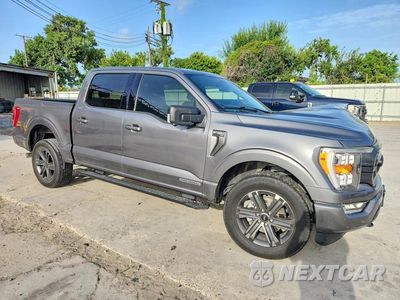 Czwarte zdjęcie samochodu z boku: 2023 FORD F150 SUPERCREW VIN:1FTFW1ED4PFD05616 - miniatura