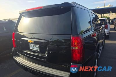 Czwarte zdjęcie samochodu z boku: 2020 CHEVROLET TAHOE K1500 LT VIN:1GNSKBKC0LR111239 - miniatura