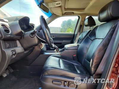 Zdjęcie 7 z 13 samochodu: 2011 HONDA PILOT EXL VIN:5FNYF4H58BB088633 - miniatura