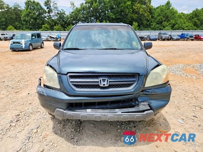 Piąte zdjęcie samochodu w środku: 2004 HONDA PILOT EXL VIN:5FNYF18664B006215 - miniatura