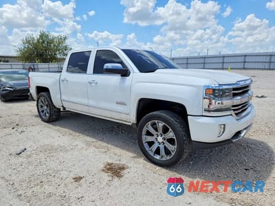 Czwarte zdjęcie samochodu z boku: 2018 CHEVROLET SILVERADO K1500 HIGH COUNTRY VIN:3GCUKTEJ3JG209633 - miniatura
