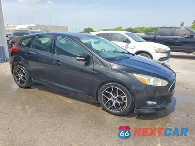 Czwarte zdjęcie samochodu z boku: 2015 FORD FOCUS SE VIN:1FADP3K25FL340514 - miniatura