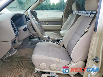 Zdjęcie 7 z 13 samochodu: 2002 NISSAN PATHFINDER SE VIN:JN8DR09X72W652187 - miniatura