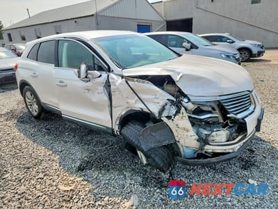 Czwarte zdjęcie samochodu z boku: 2017 LINCOLN MKX PREMIERE VIN:2LMPJ8JR8HBL37033 - miniatura