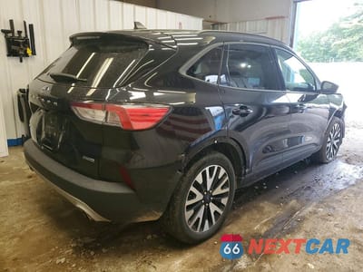 Trzecie zdjęcie samochodu z tyłu: 2020 FORD ESCAPE SE SPORT VIN:1FMCU9BZ1LUC03506 - miniatura