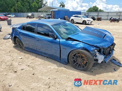 Czwarte zdjęcie samochodu z boku: 2023 DODGE CHARGER SCAT PACK VIN:2C3CDXGJ3PH607660 - miniatura