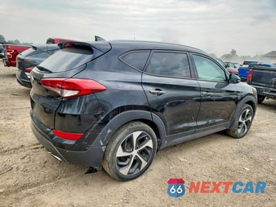 Trzecie zdjęcie samochodu z tyłu: 2016 HYUNDAI TUCSON LIMITED VIN:KM8J3CA22GU240470 - miniatura