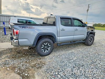 Trzecie zdjęcie samochodu z tyłu: 2020 TOYOTA TACOMA TRD OFF-ROAD VIN:3TMAZ5CN7LM129370 - miniatura