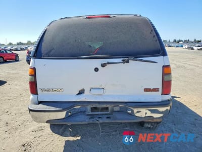 Zdjęcie 6 z 14 samochodu: 2002 GMC YUKON VIN:1GKEC13T42R131783 - miniatura