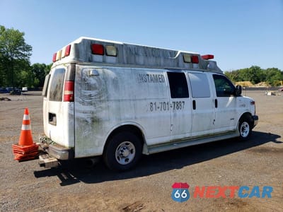 Trzecie zdjęcie samochodu z tyłu: 2009 CHEVROLET EXPRESS G3500 VIN:1GBHG396291144295 - miniatura