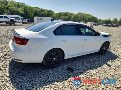 Trzecie zdjęcie samochodu z tyłu: 2018 VOLKSWAGEN JETTA SPORT VIN:3VWD17AJ8JM206550 - miniatura