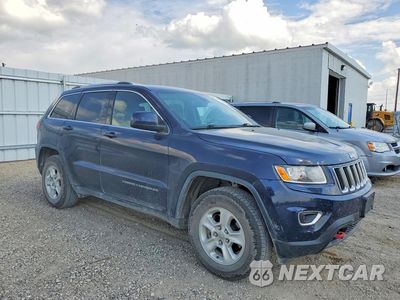 Czwarte zdjęcie samochodu z boku: 2016 JEEP GRAND CHEROKEE LAREDO VIN:1C4RJFAG4GC472133 - miniatura