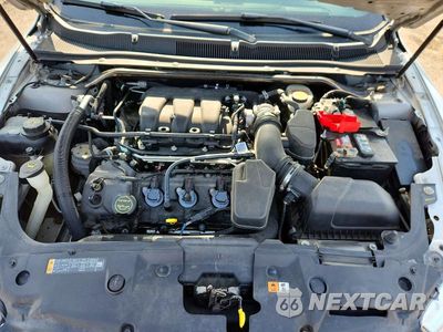 Zdjęcie 11 z 12 samochodu: 2015 FORD TAURUS VIN:1FAHP2J83FG116801 - miniatura