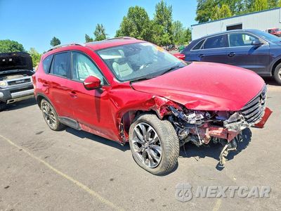 Czwarte zdjęcie samochodu z boku: 2016 MAZDA CX-5 GT VIN:JM3KE4DY0G0664754 - miniatura