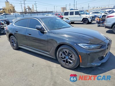 Czwarte zdjęcie samochodu z boku: 2024 BMW I4 EDRIVE 40 VIN:WBY73AW07RFT00954 - miniatura