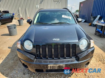Piąte zdjęcie samochodu w środku: 2009 JEEP COMPASS SPORT VIN:1J4FT47A29D139814 - miniatura