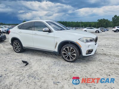 Czwarte zdjęcie samochodu z boku: 2016 BMW X6 SDRIVE35I VIN:5UXKU0C53G0F92297 - miniatura