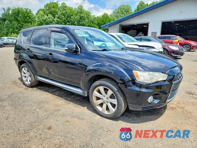 Czwarte zdjęcie samochodu z boku: 2010 MITSUBISHI OUTLANDER GT VIN:JA4JT5AXXAZ007145 - miniatura