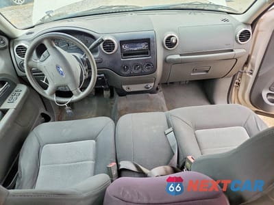 Zdjęcie 8 z 12 samochodu: 2003 FORD EXPEDITION XLT VIN:1FMRU15W23LA61069 - miniatura
