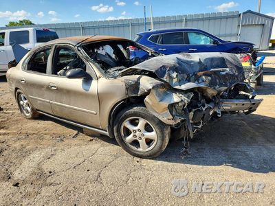 Czwarte zdjęcie samochodu z boku: 2003 FORD TAURUS VIN:1FAFP53U03G118505 - miniatura