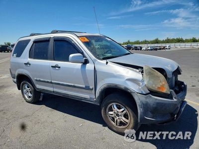 Czwarte zdjęcie samochodu z boku: 2002 HONDA CR-V EX VIN:JHLRD78892C004356 - miniatura