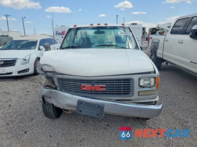 Piąte zdjęcie samochodu w środku: 1995 GMC SIERRA VIN:1GDJC34KXSE522533 - miniatura