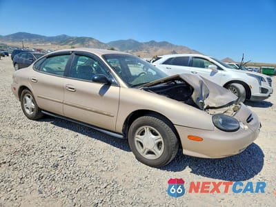 Czwarte zdjęcie samochodu z boku: 1999 FORD TAURUS SE VIN:1FAFP53U0XA295435 - miniatura