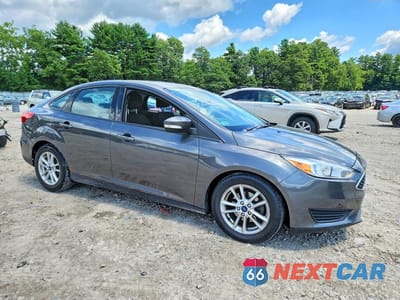 Czwarte zdjęcie samochodu z boku: 2016 FORD FOCUS SE VIN:1FADP3F27GL200539 - miniatura