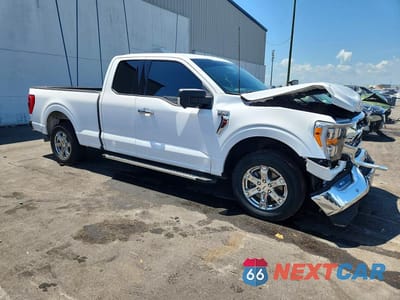 Czwarte zdjęcie samochodu z boku: 2022 FORD F150 SUPER CAB VIN:1FTEX1CB4NKE16083 - miniatura