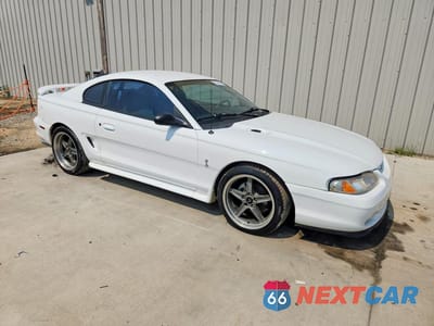 Czwarte zdjęcie samochodu z boku: 1996 FORD MUSTANG GT VIN:1FALP42X2TF228664 - miniatura