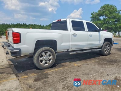 Trzecie zdjęcie samochodu z tyłu: 2019 CHEVROLET SILVERADO C2500 HEAVY DUTY LT VIN:1GC1CSEG7KF213444 - miniatura