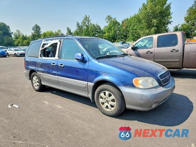 Czwarte zdjęcie samochodu z boku: 2005 KIA SEDONA LX VIN:KNDUP131256662030 - miniatura