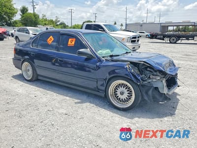 Czwarte zdjęcie samochodu z boku: 1998 HONDA CIVIC LX VIN:2HGEJ6676WH515679 - miniatura