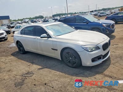 Czwarte zdjęcie samochodu z boku: 2013 BMW 750 LI VIN:WBAYE8C55DD132113 - miniatura