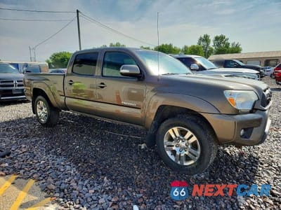 Czwarte zdjęcie samochodu z boku: 2012 TOYOTA TACOMA DOUBLE CAB LONG BED VIN:3TMMU4FN3CM048271 - miniatura